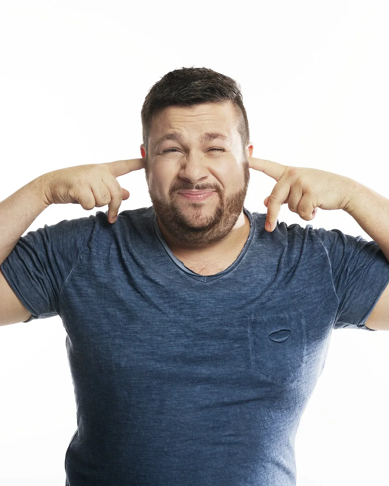 Christian Hull with fingers in his ears
