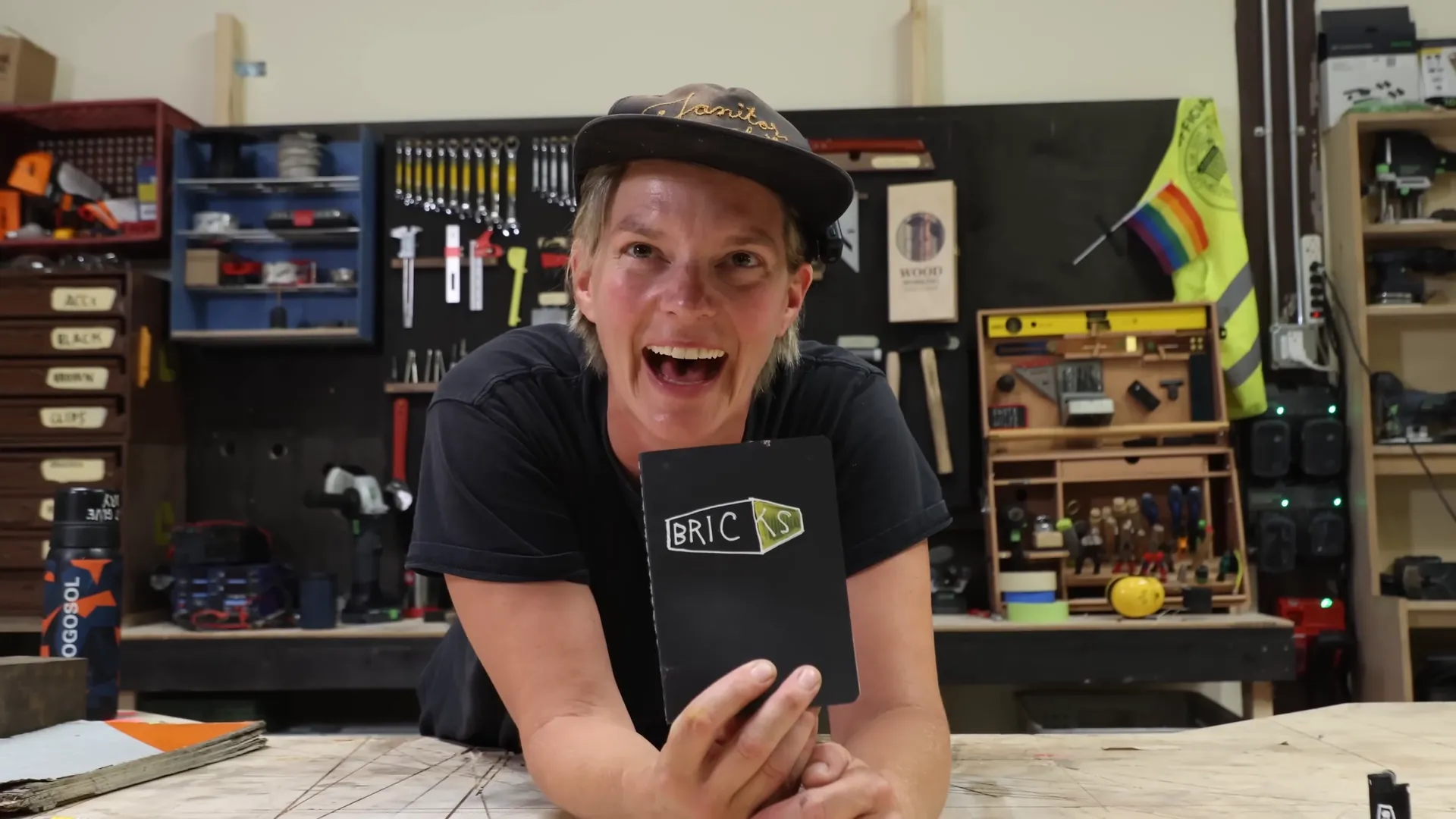 Laura Kampf laughing at her workbench
